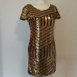 Black and gold sequin low back mini dress